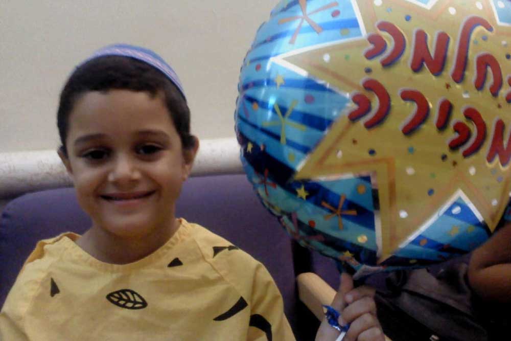 Hillel following the successful removal of a brain tumor