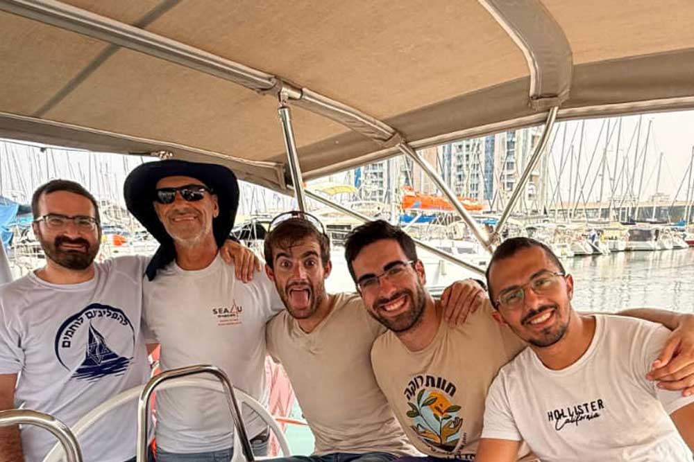 "I decided that I would call on the soldiers to come and clear their heads after all the horrors they saw in the Gaza Envelope" (Chezi and the soldiers on leave)