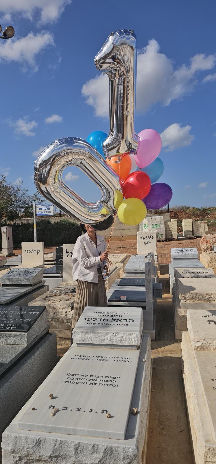 Visiting Harel's grave on his birthday