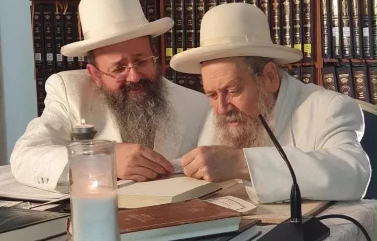 Rabbi David Batzri z”l (right) with his son, Rabbi Yitzhak Batzri