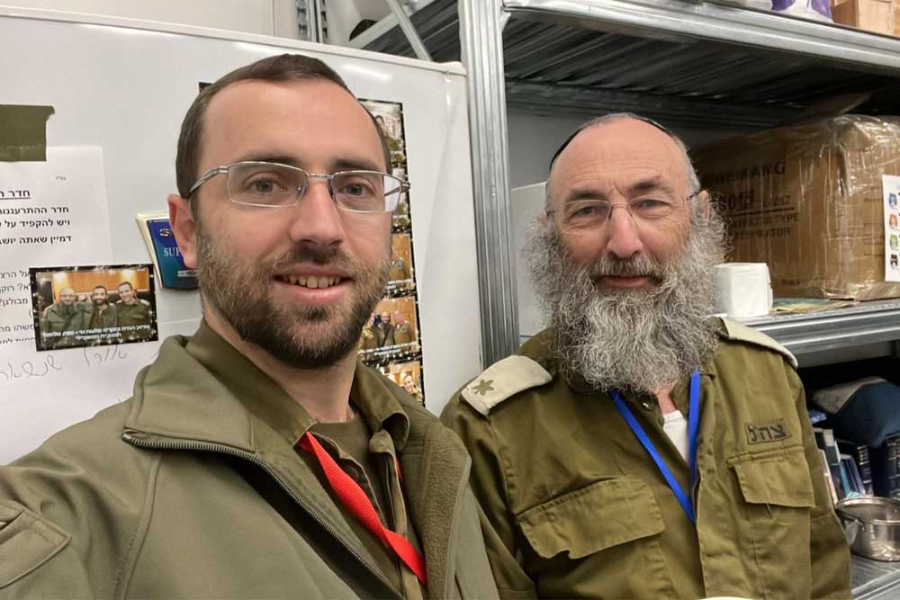 Oved's post-traumatic stress disorder was diagnosed at a late stage (Rabbi Pearl and his son Oved)