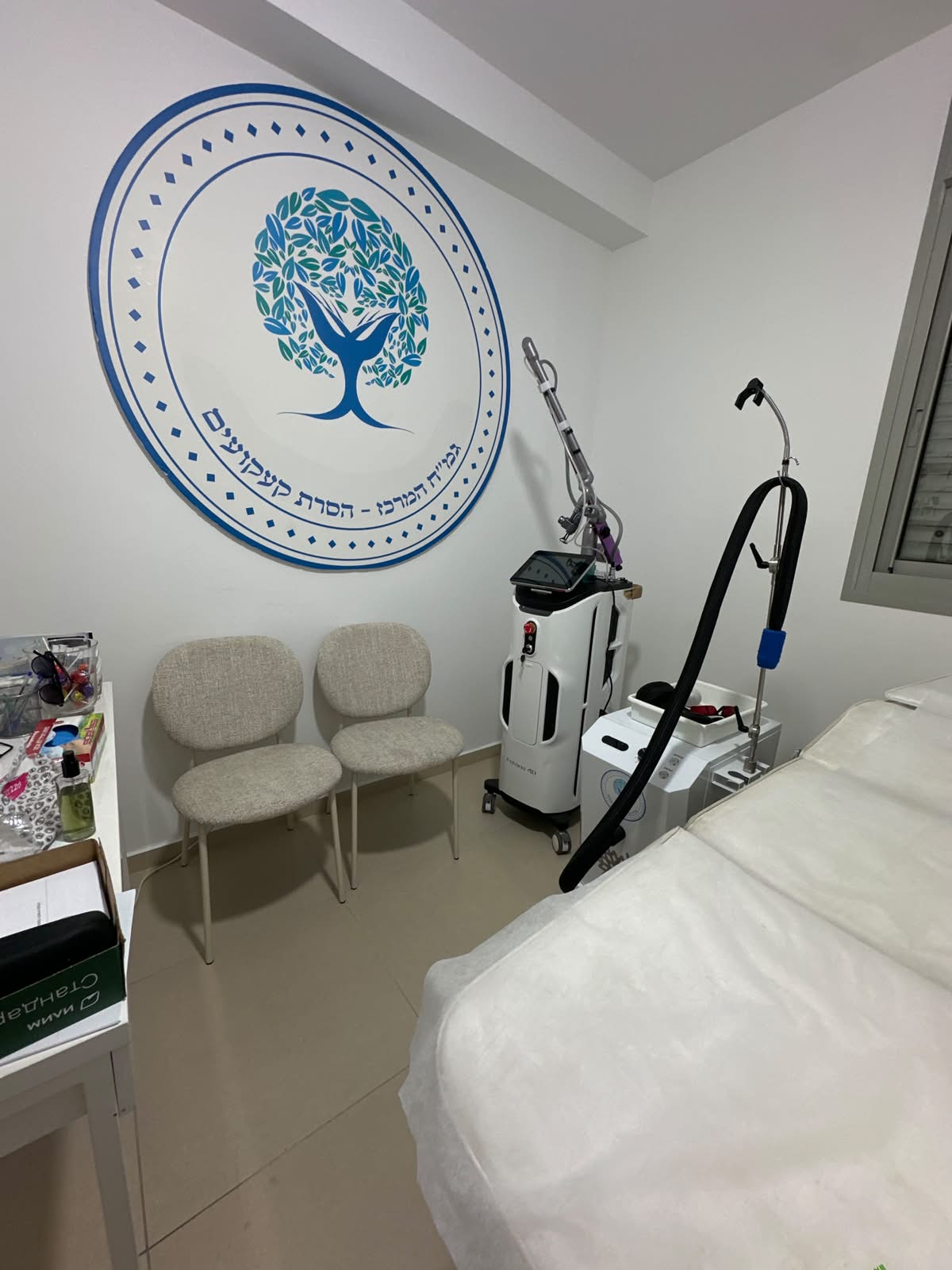 Liran opened a tattoo removal clinic