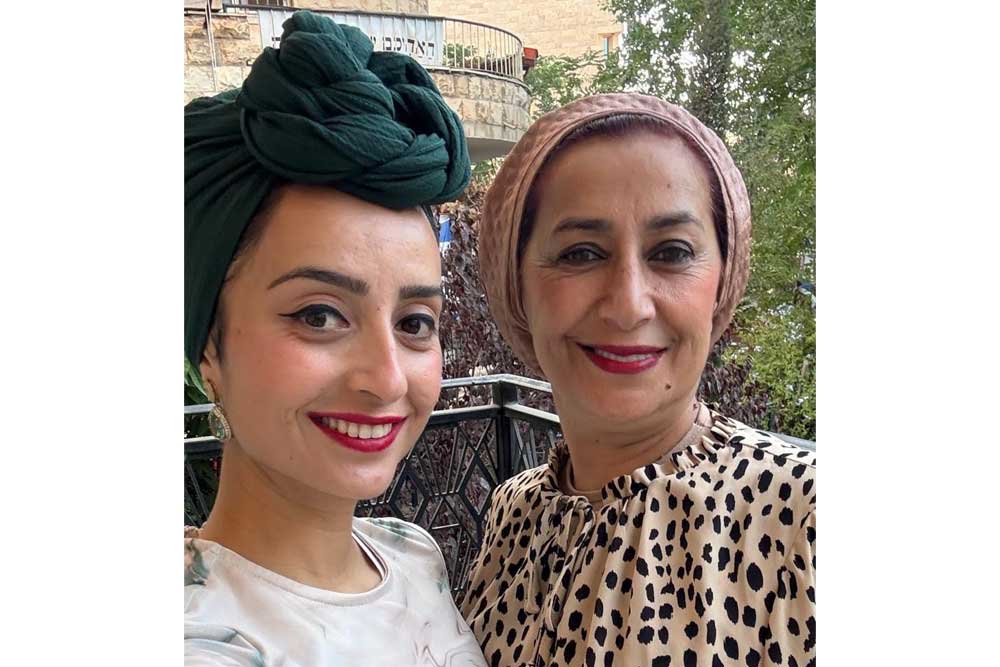 With her mother, today