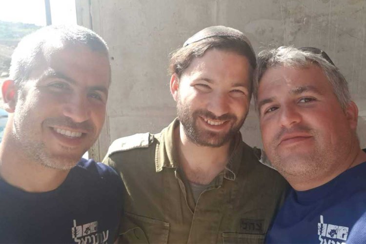 Elchanan (right) with his brother Menachem and nephew Itiel