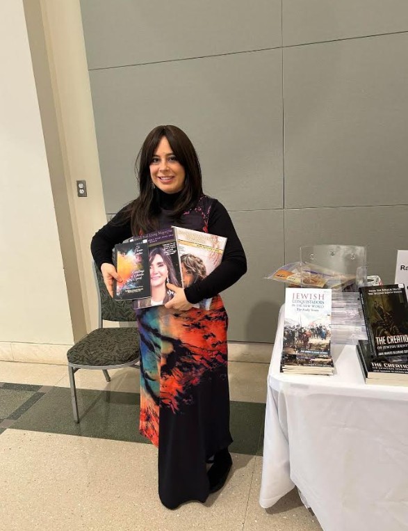 Chana Miriam Bejarano Gutierrez with her books and magazine