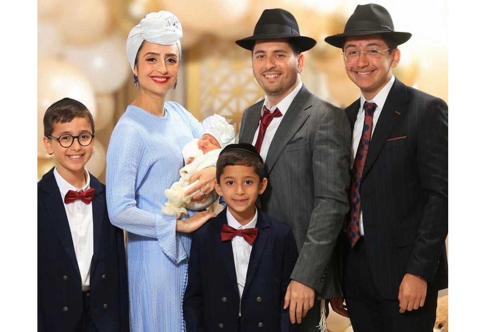 With her husband and children