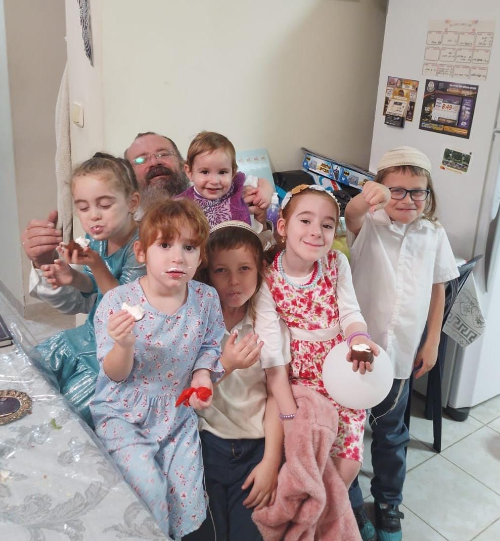 Yitzhak with his grandchildren