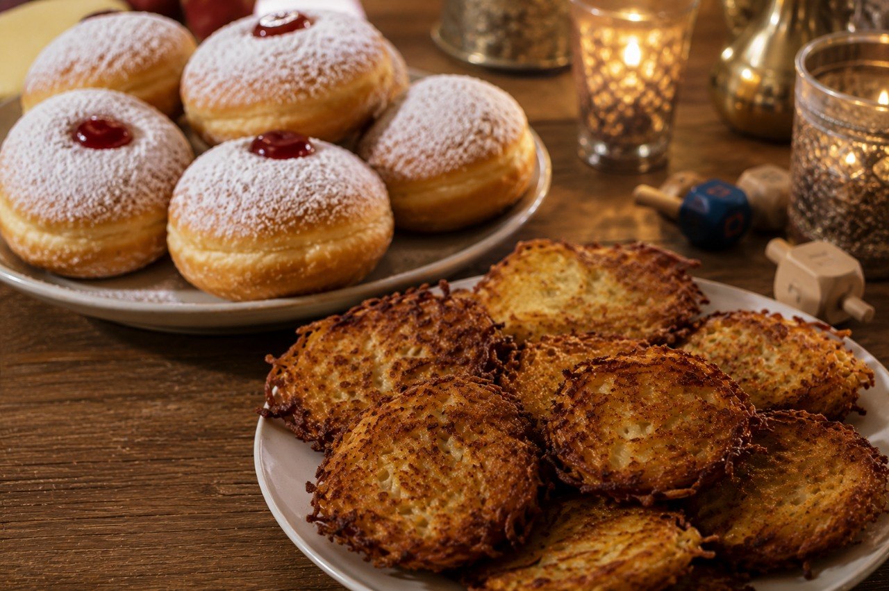 Traditional Hanukkah latkes / sufganiyot fried in oil